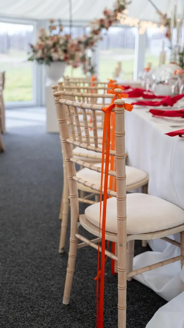 A neutral place setting with LED candles and flowers