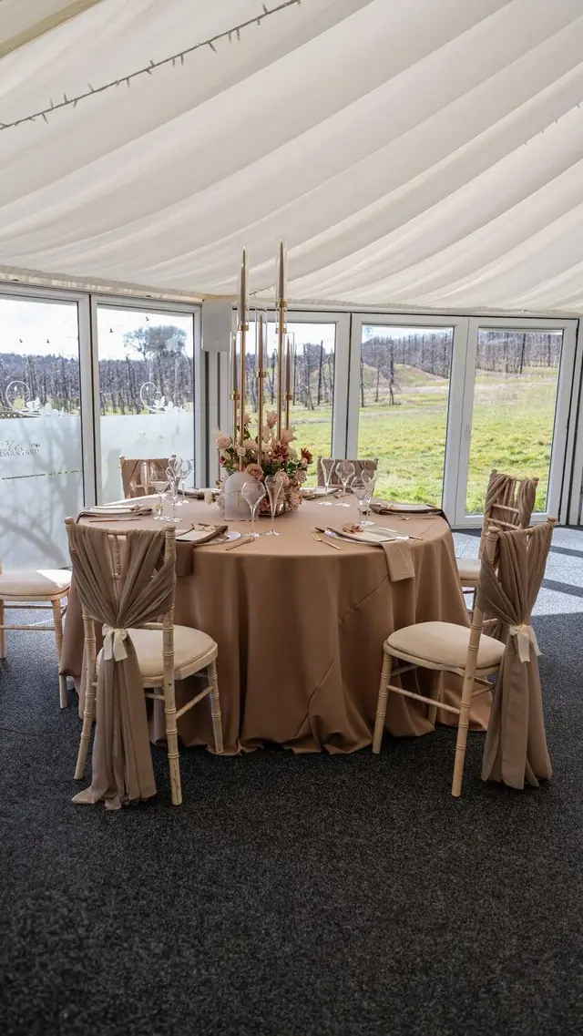 A menu card at a dressed place setting