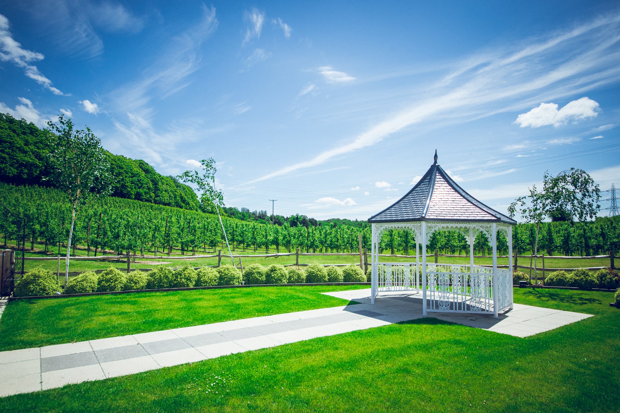 The Orchard Garden gazebo at The BarnYard, set for an outdoor ceremony