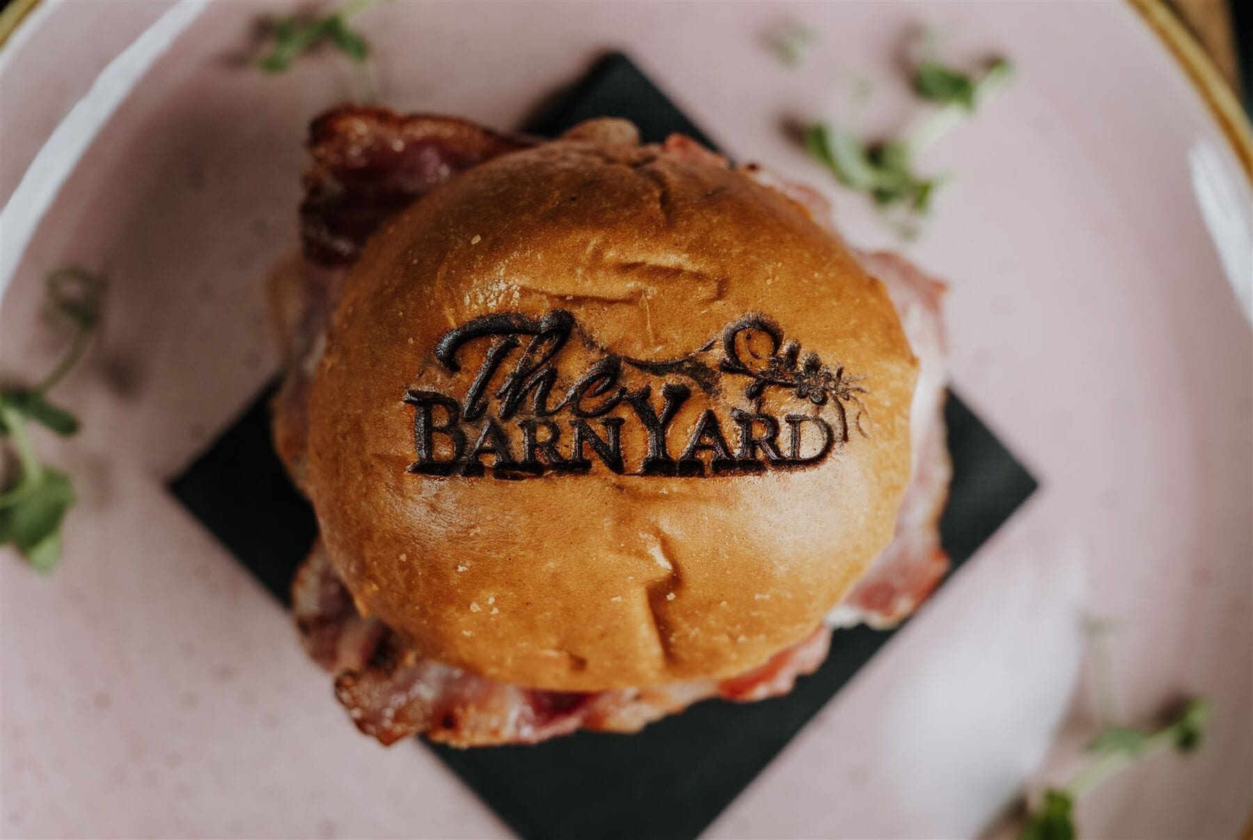 A wedding breakfast being served at The BarnYard, Kent