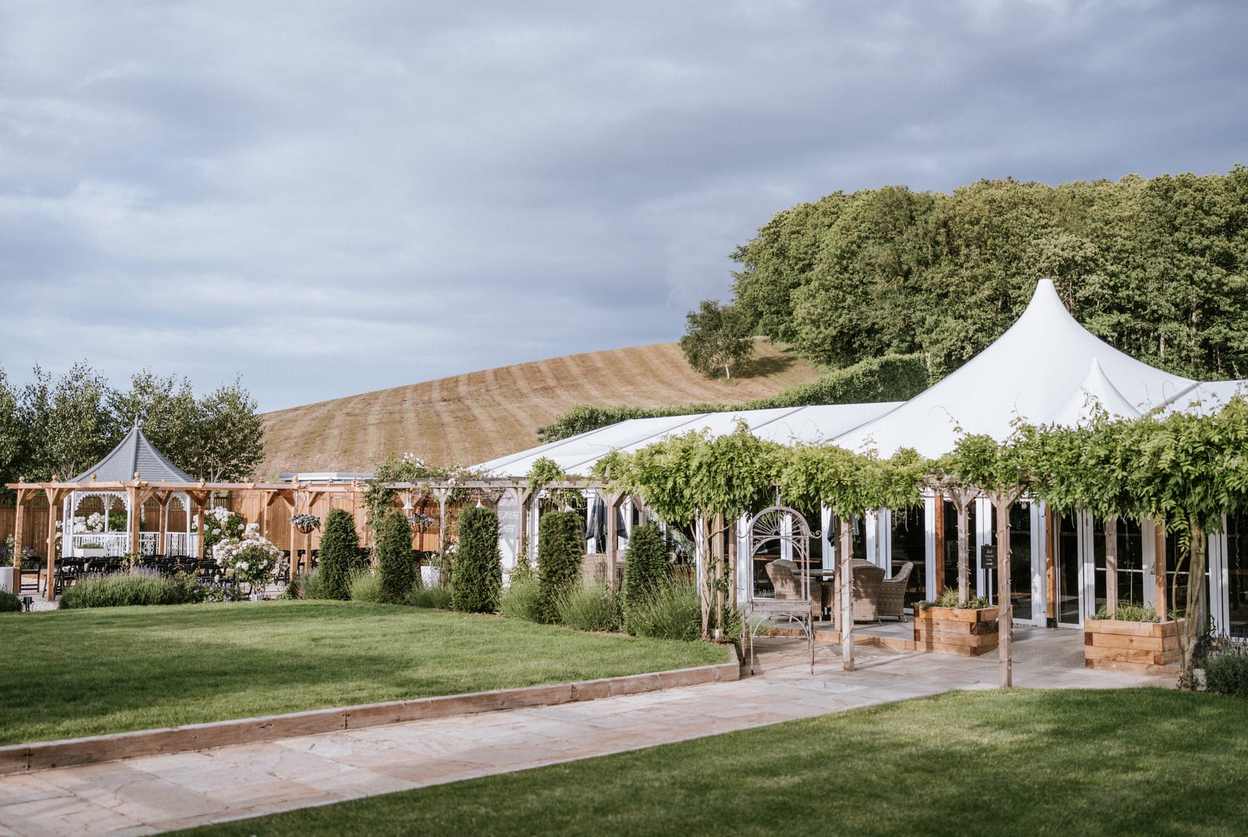 The pavilion and gardens at The BarnYard, set up for an event