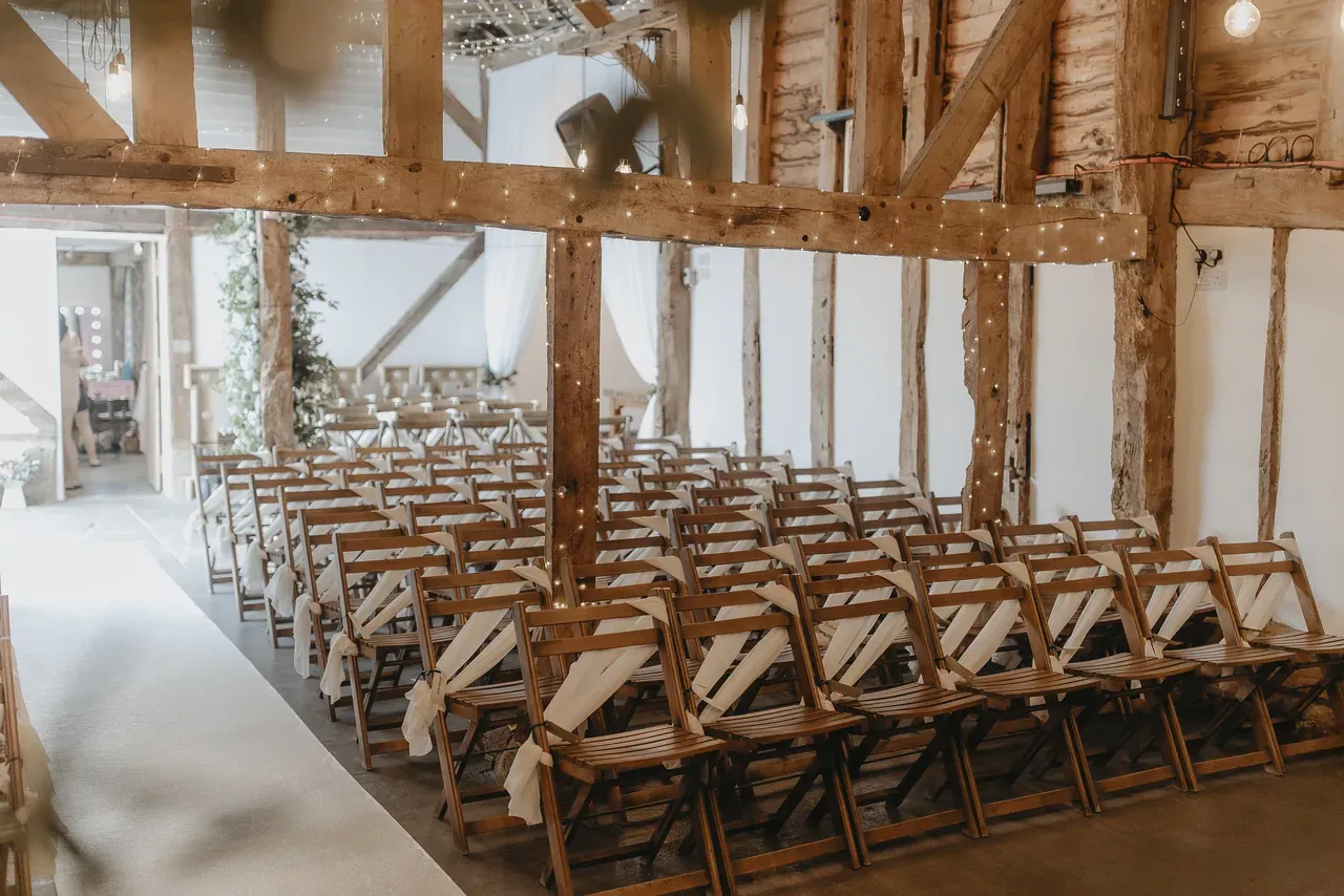 Wedding ceremony inside The Apple Barn at The BarnYard
