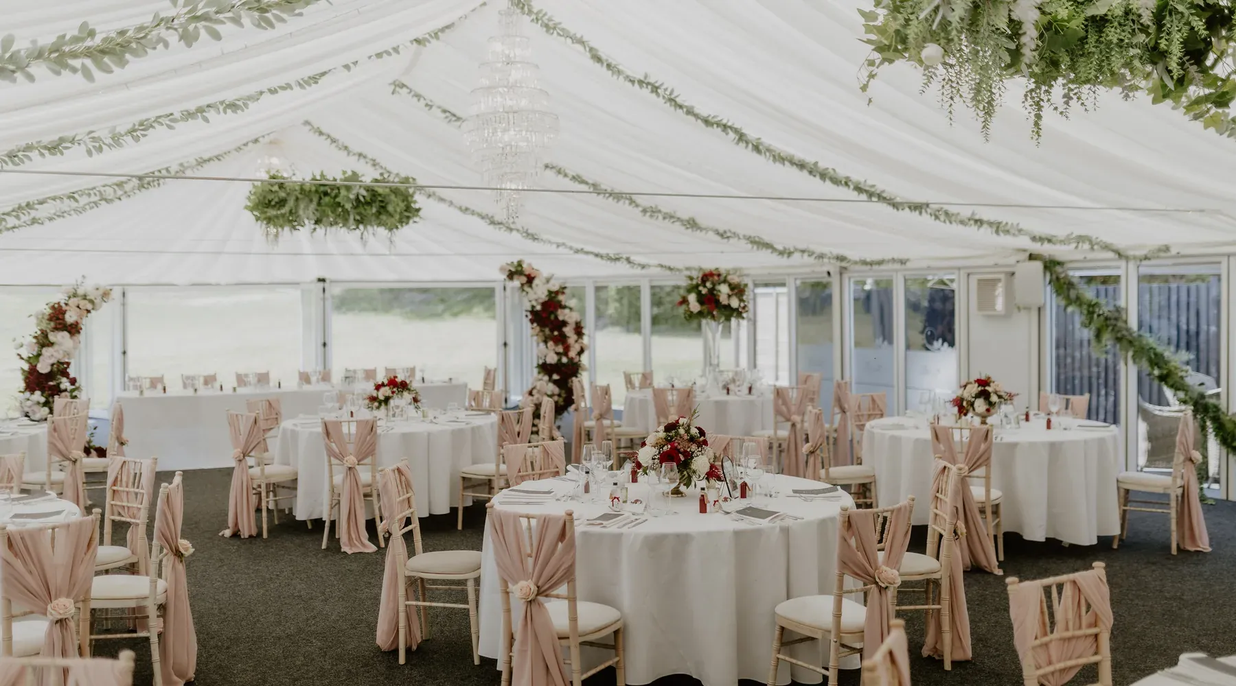 An evening reception glowing with fairy lights at The BarnYard