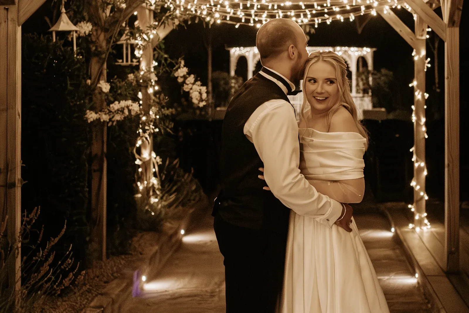 The Apple Barn lit with fairy lights at The BarnYard