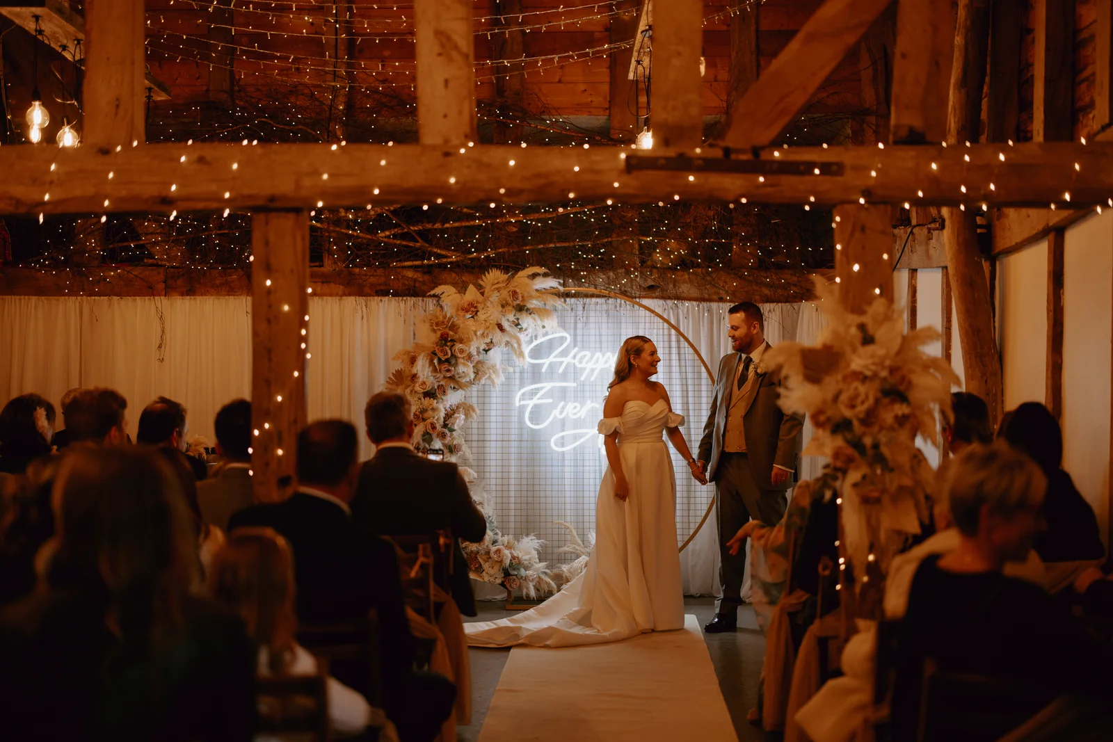 The Apple Barn lit with fairy lights at The BarnYard